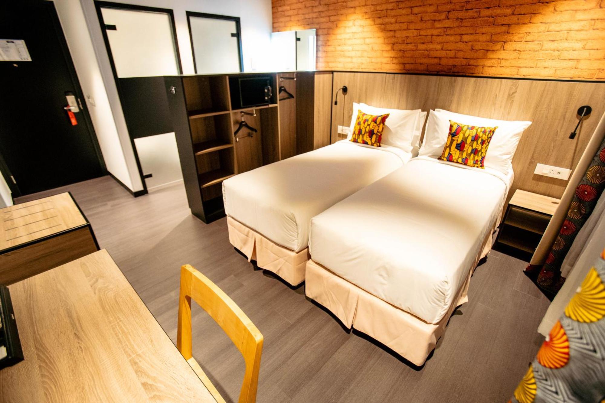 Onomo Hotel Кампала Экстерьер фото