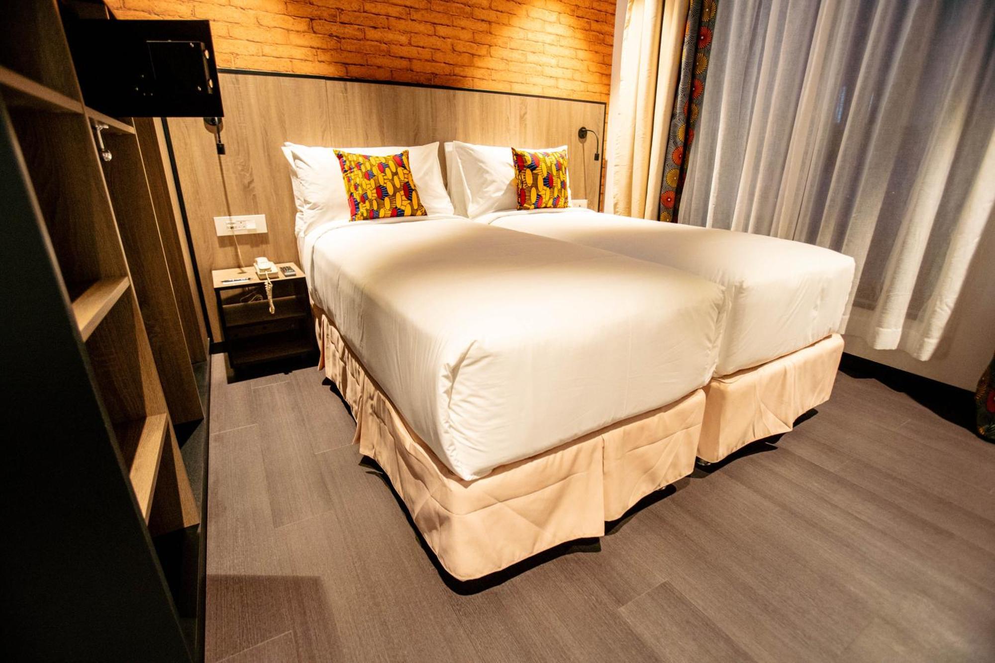 Onomo Hotel Кампала Экстерьер фото