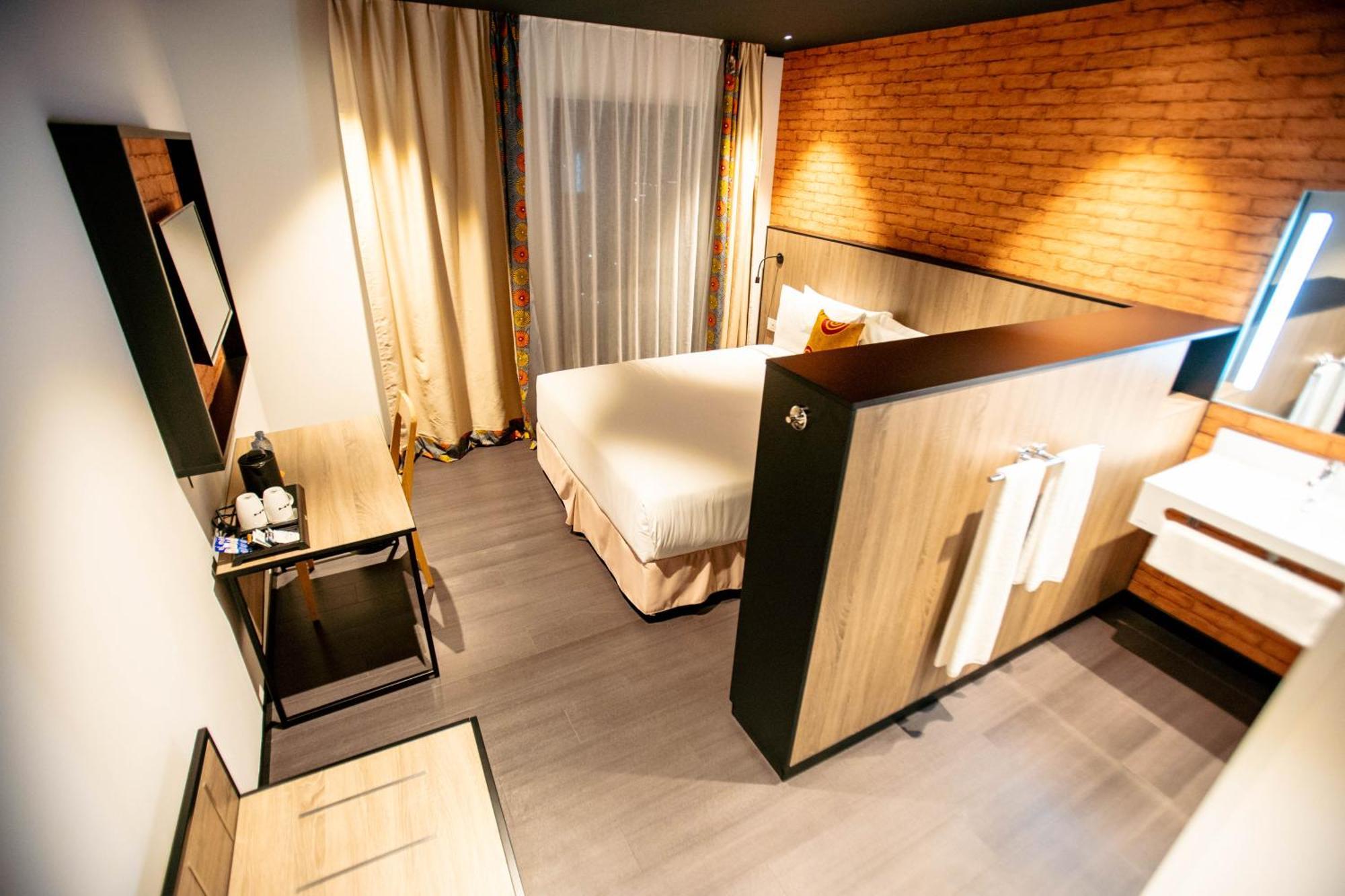 Onomo Hotel Кампала Экстерьер фото
